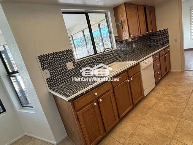 Photo - 3-bedroom, 2-bath home located in a quiet Sun City neighborhood, featuring solar panels for energ...