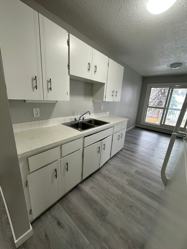 Building Photo - 4507-344 44 Ave Unit 304