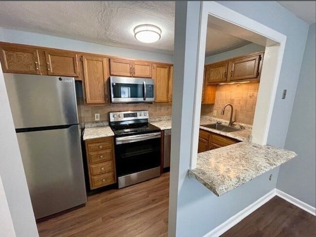 Photo - Fresh 1 Bedroom Corner Condo with 2 Off Street Parking Spaces