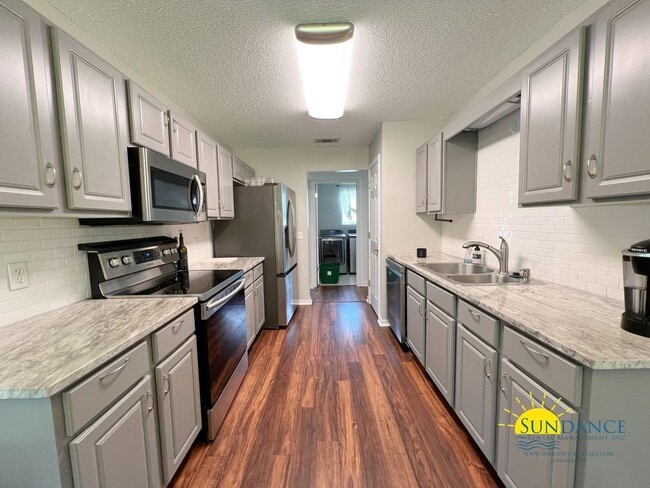 Photo - Spacious 3-Bedroom Home with Solar Panels & Lawn Maintenance Included in South Crestview