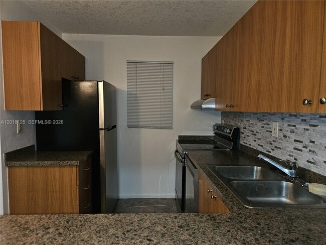 Photo - 7610 Stirling Rd Unidad 102C