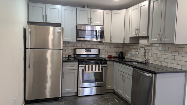 Building Photo - 7038 Valley Ave Unit 1