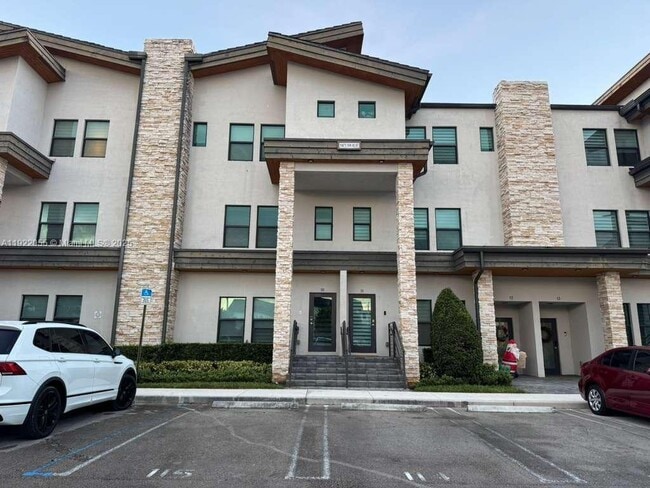 Building Photo - 10473 NW 82nd St Unit 10