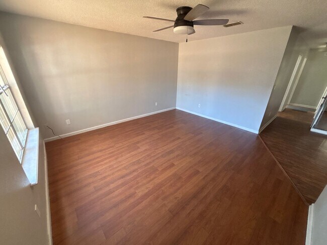 Photo - Spacious 4-Bed, 2-Bath Home with Yard and ...