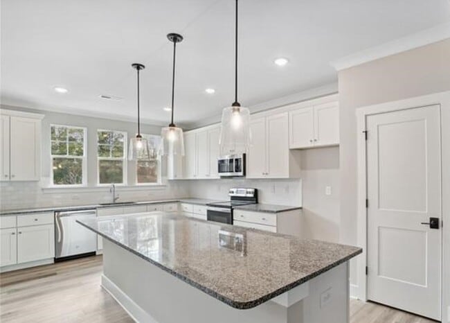 Photo - Completely NEW! 3BR w/ 2-Car Garage + Balcony