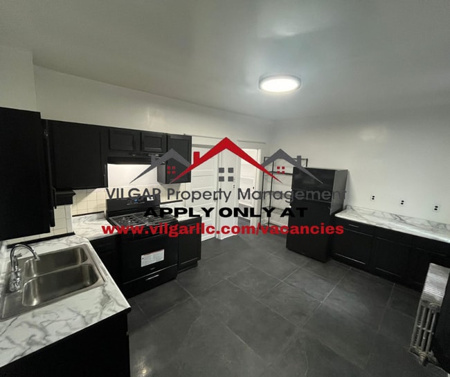 Building Photo - 5035 Olcott Ave Unit 1st floor