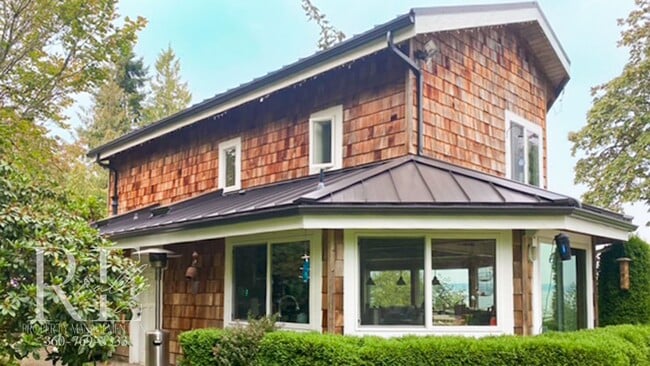 Photo - Waterfront Rustic Retreat with Vaulted Ceilings, Picture Windows & Lofted Nook