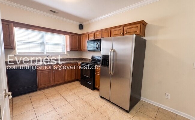 Photo - 3 Bed, 2 Bath Home with Garage / Available Now!