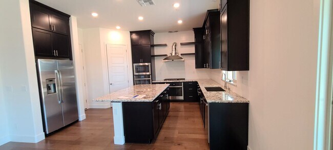 Photo - Stunning home with luxurious wood floor and beautiful spacious yard