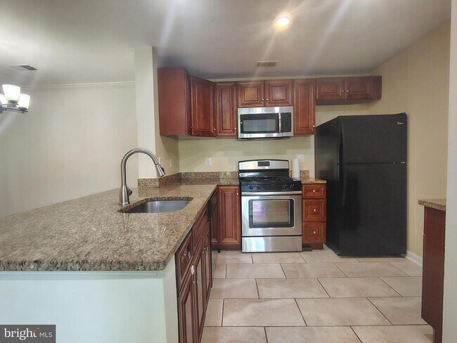 Photo - 17701 Kilmarnock Terrace Unit 1-N