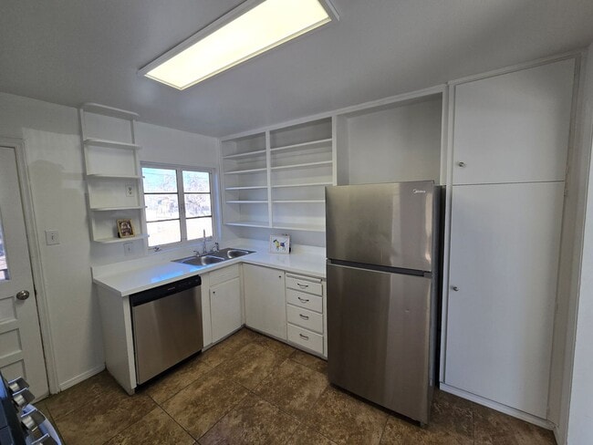 Photo - Centrally located in the NE Heights 4 bedroom, 1 3/4 Bath 1900 square feet.