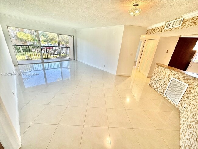 Photo - 8955 Wiles Rd Unidad 208