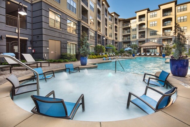 Resort-Style Pool with In-Water Loungers - Overton Rise Apartments