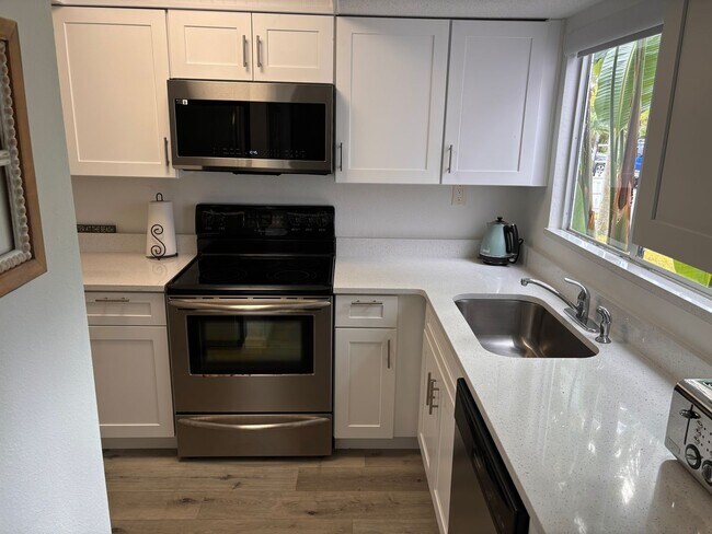 Photo - Furnished Beachside Townhome 2 bedroom/ 1.5 bath Dog Friendly Walk to beach