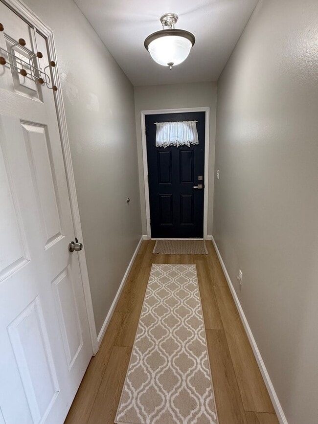 Photo - Updated 3BR Home with Laminate Flooring Throughout & Spacious Yard