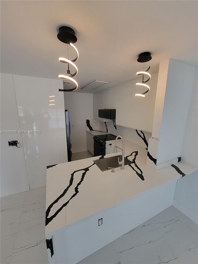 Building Photo - 10034 NW 6th St Unit 204