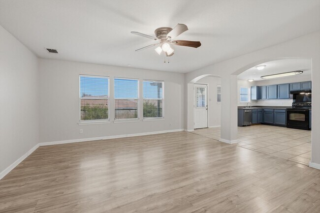 Photo - 4BR Home with Open Living Area & Included Appliances