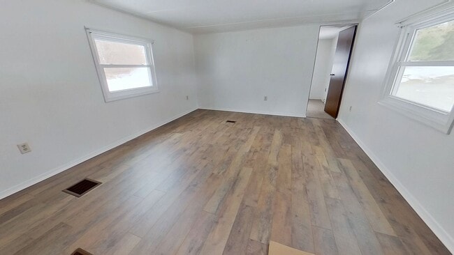 Photo - First-Floor Living with Private Wooded Backyard Setting