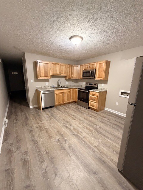 Kitchen - Brand New Cabinets and Flooring and New Microwave