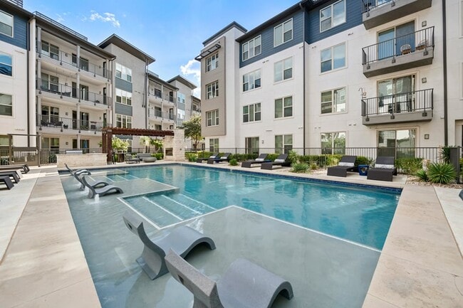 Second resort-style pool with sundeck - The Addison Apartments