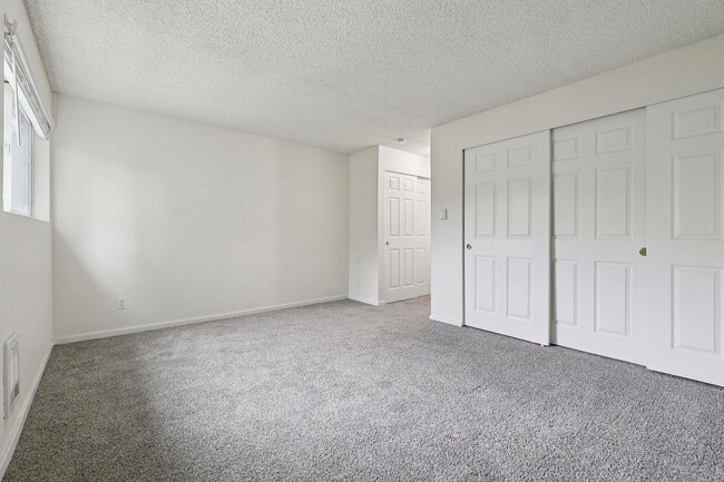 Bright, modern bedroom in Foster Creek apartment, Tukwila, WA.