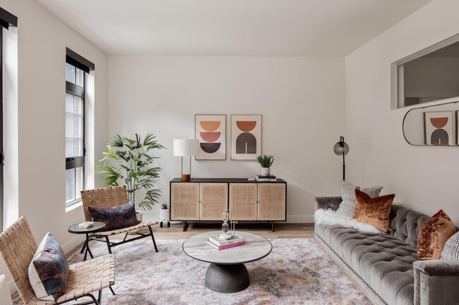 Open layout living area flooded with natural light