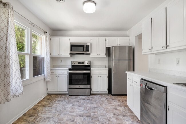 Photo - 3 to 4 Bed/3 1/2 Bath. Pet friendly. Reserved Parking