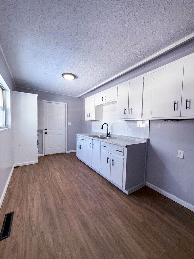 Photo - Move-In Ready 3BR Home w/ Eat-In Kitchen, Yard & Off-Street Parking