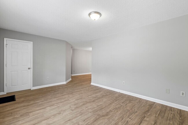 Photo - NW Home - Updated Kitchen and Bathrooms, Wood Laminate Flooring, Deck, Must See!