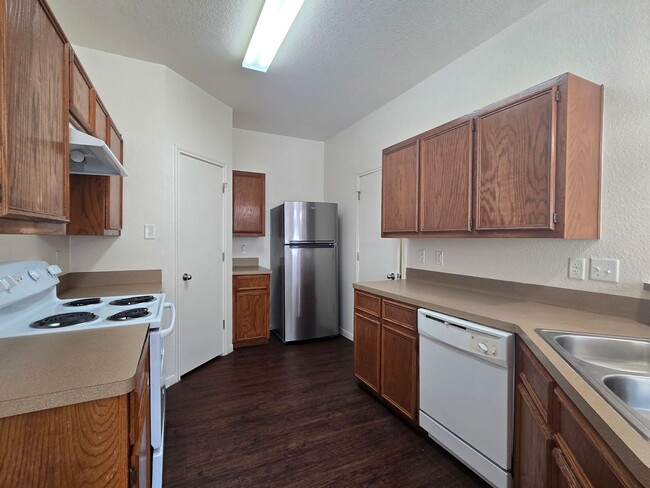 Photo - COMING SOON! Unit 3807 John Chisholm Loop - A