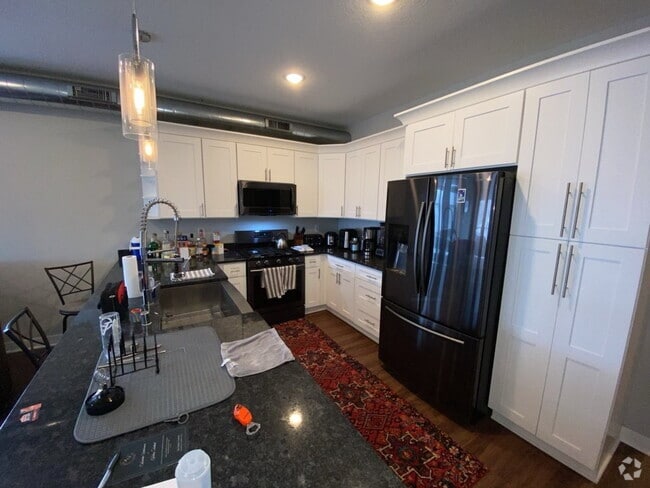 Building Photo - Stunning Sunsets on the Rooftop at this Be... Rental