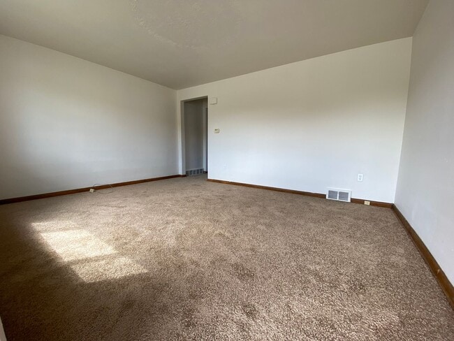 Photo - Charming Two Bedroom Townhome with a Private Basement & a Shared Backyard Space! Call Today!