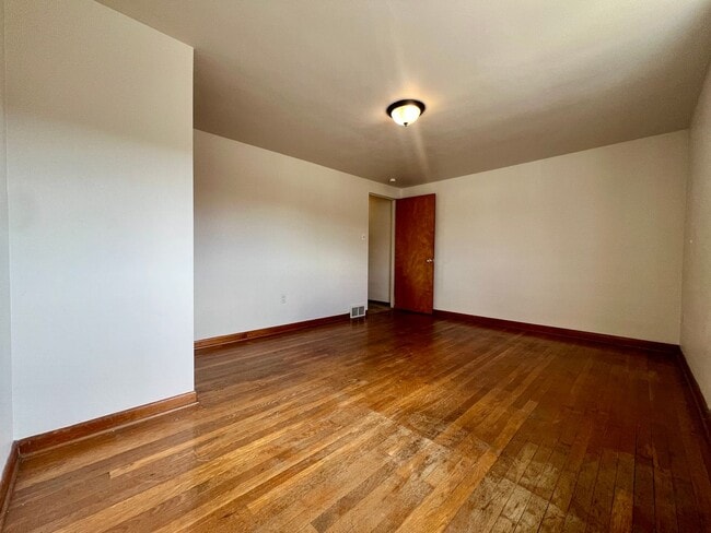 Photo - Cozy Two Bedroom Townhome with Central AC & Off-Street Parking! Call Today to Schedule a Tour!