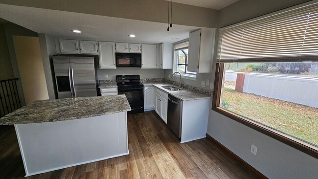 Photo - Spacious Townhome with Finished Basement i...