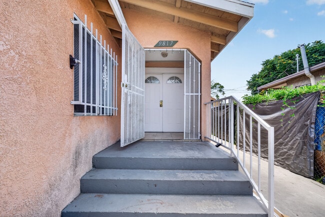 Building Photo - 9817 Holmes Ave