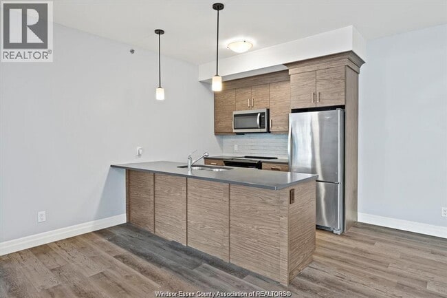 Photo - 5840 Newman Blvd Unité 103