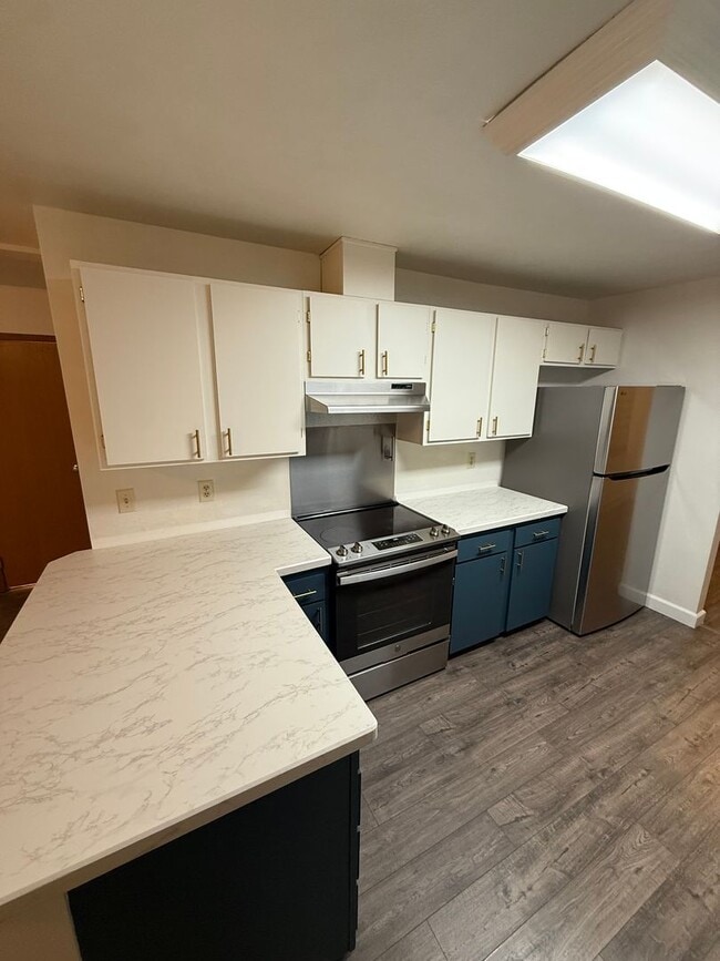 Photo - Spacious 4-bedroom / Heat included / 1 car garage