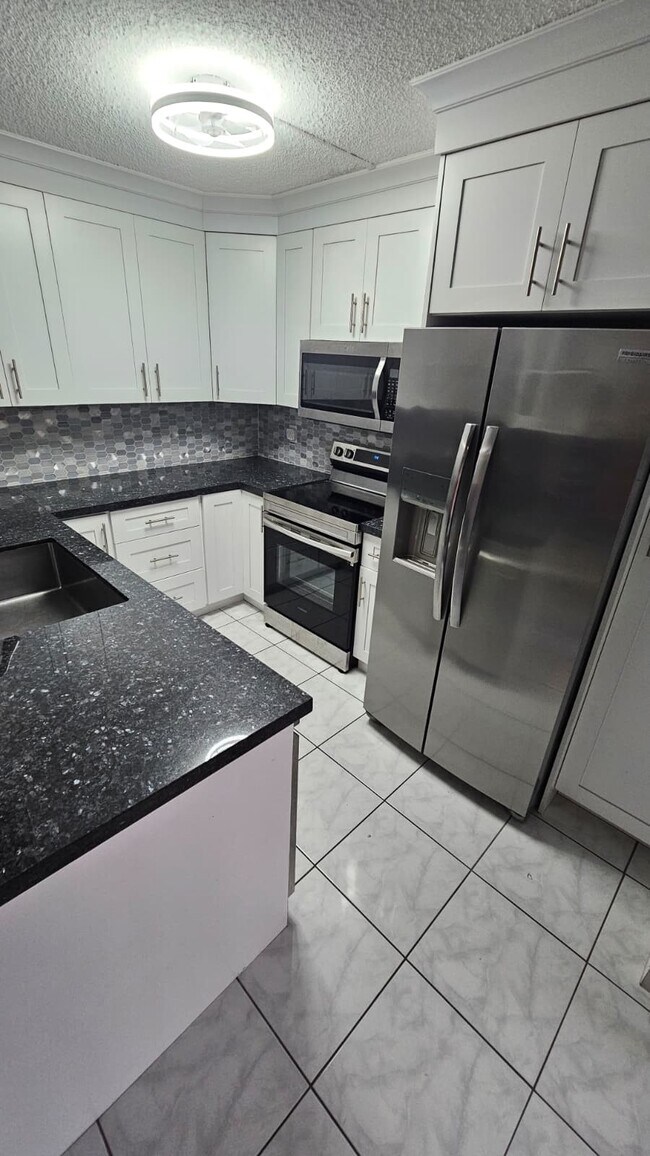 Photo - 11880 SW 13th Ct