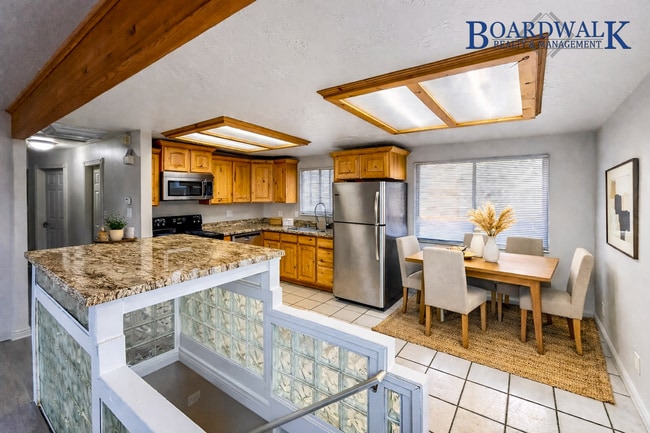 Photo - Spacious 5-Bedroom Home with Lofted Garage