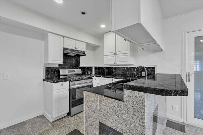 Building Photo - 5210 Woodrow Ave