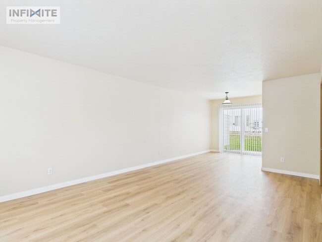 Building Photo - Bright & Spacious 2 Bedroom, 2 Bath Condo with Single Detached Garage – Move-In Ready!