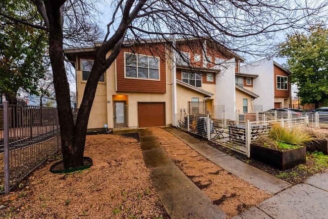 Photo - Modern Downtown Austin Living: 2 Suites, EV Charger, Gated Yard, and Unbeatable East Austin Vibes!