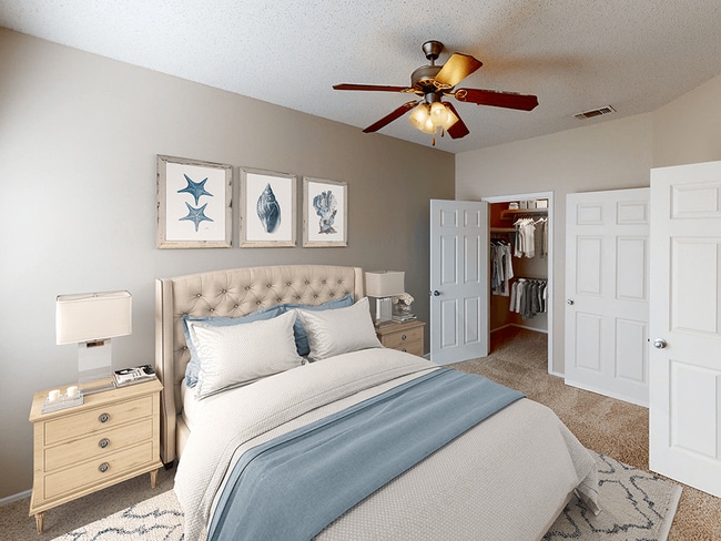 Bedroom with Overhead Fan and Large Closet