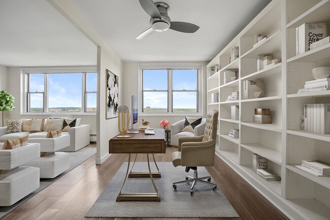 Luxurious open-space apartment with elegant home office, and bright living area overlooking an unobstructed water view at Parkside Place, apartments in Cambridge, MA