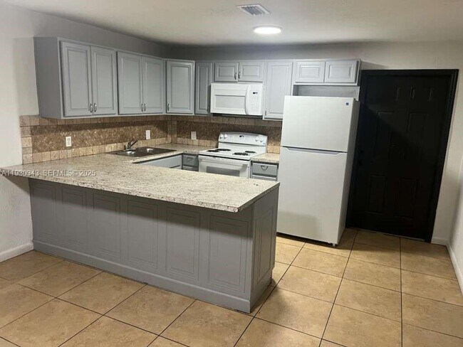 Building Photo - 3057 NW 63rd St