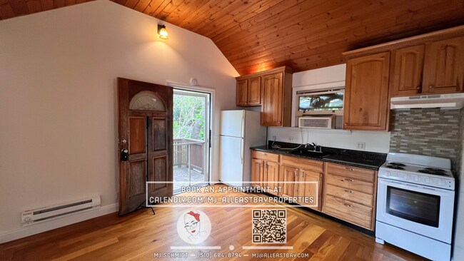 Photo - Quaint cottage with hardwood floors, private entrance and patio, surrounded by lush gardens!