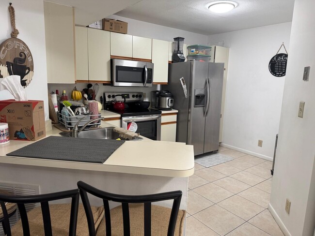 Photo - 8955 Wiles Rd Unit 206