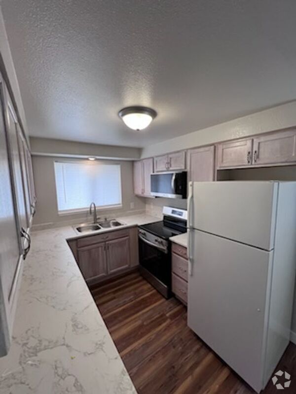 Building Photo - 1501 W 14th Ave Unit #D Rental