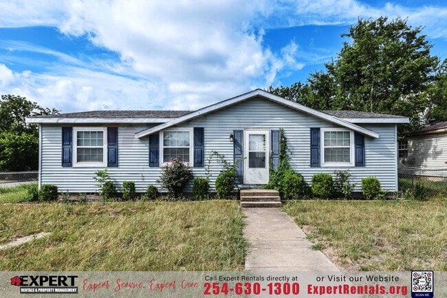Photo - A cozy 3-bedroom, 2-bathroom home nestled on a corner lot