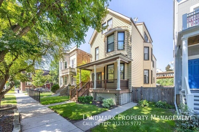 Building Photo - 2176 W Eastwood Ave Unit 1
